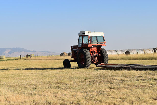Hay Fields Tractor Moving Bales Galt Ranch